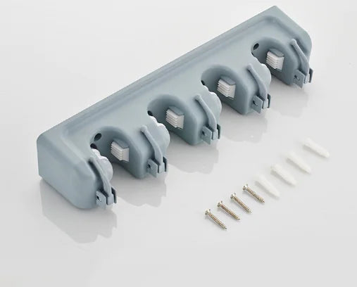 Gray wall-mounted mop and broom holder with five adjustable clamps and mounting screws