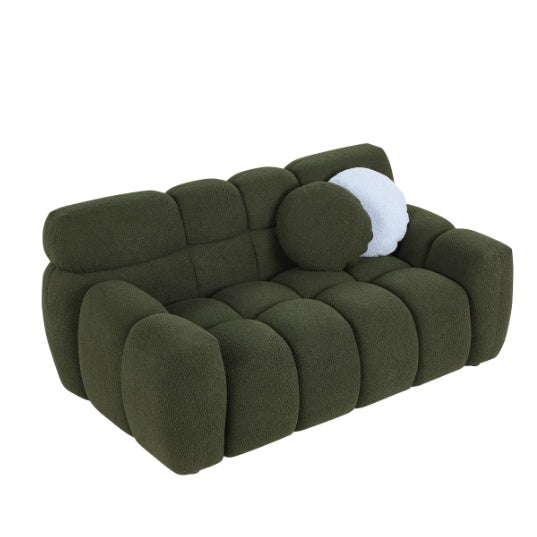 Shopi Vella green upholstered sofa with plush cushioning and two round pillows for living room comfort