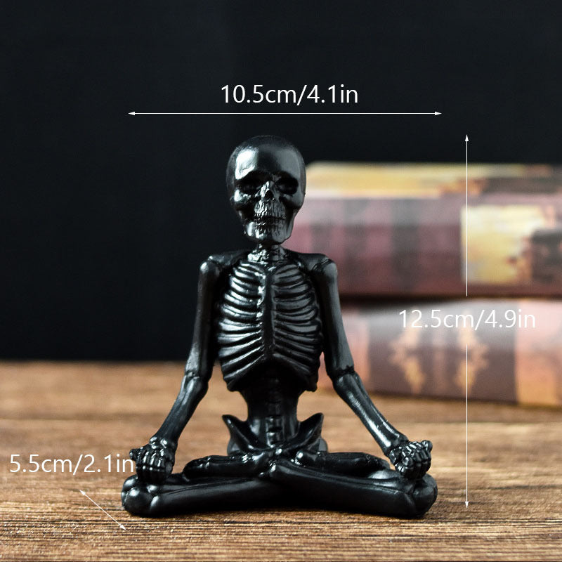 Black halloween yoga skeleton decor in a seated meditation pose for home storage display
