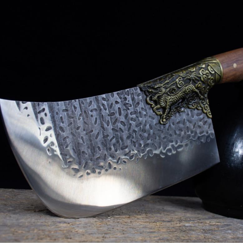 My Store hand-forged bone chopping knife with textured blade and wooden handle detail