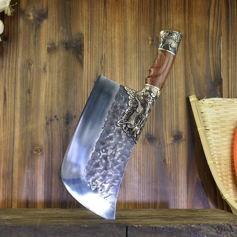 My Store hand-forged bone chopping knife with decorative handle on wooden surface