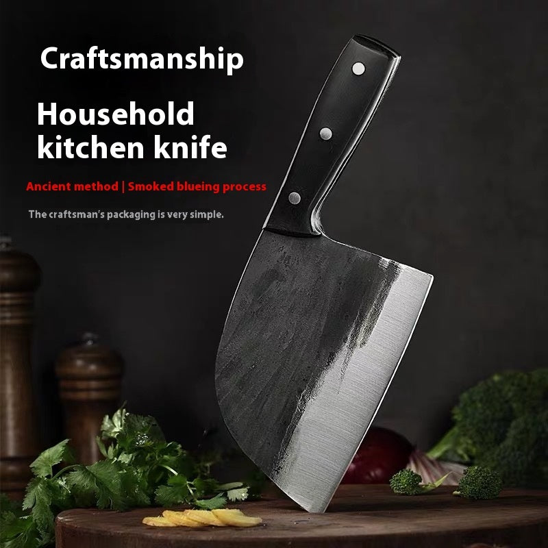 Shopi Vella hand-forged kitchen slicing knife with black handle and smoky blade on wooden cutting board