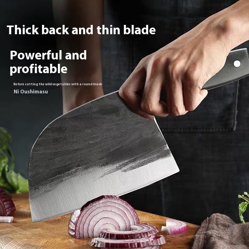 Shopi Vella hand-forged kitchen slicing knife cutting sliced onions on wooden board