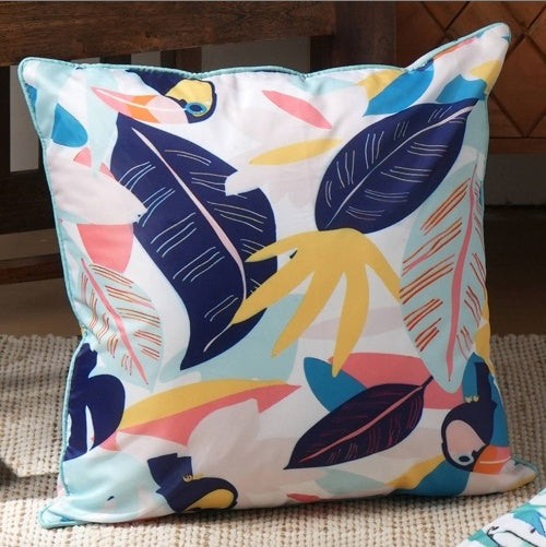 Shopi Vella hand printed decorative pillow case with colorful tropical leaf and bird design