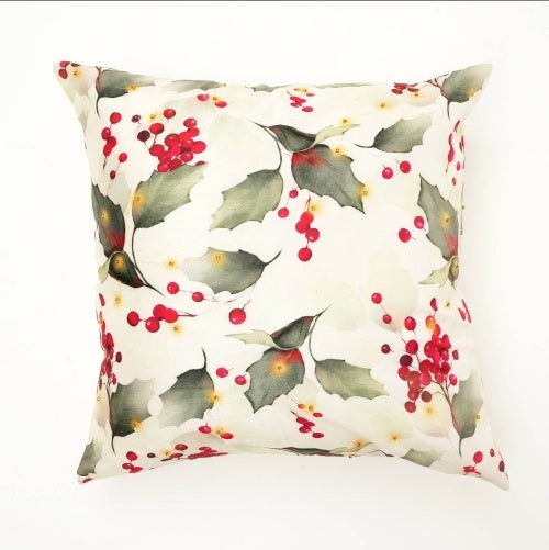 Shopi Vella hand printed decorative pillow case with green leaves and red berries on white background