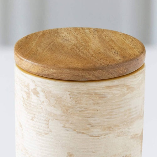 Shopi Vella handcrafted ceramic jar with a smooth beige finish and a wooden lid for stylish storage