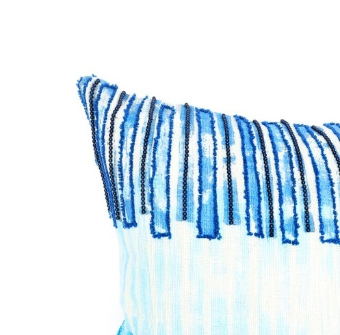 Shopi Vella handcrafted coastal pillow case with blue striped embroidery and sequin detailing