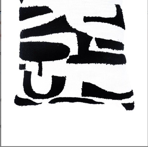 Shopi Vella black and white handcrafted cotton tufted pillow case with abstract design