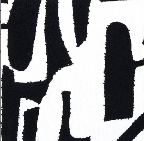 Shopi Vella handcrafted cotton tufted pillow case with black and white abstract design