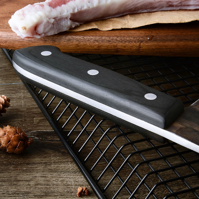 My Store high hardness chopping knife with black handle and three rivets on wooden and metal grill background