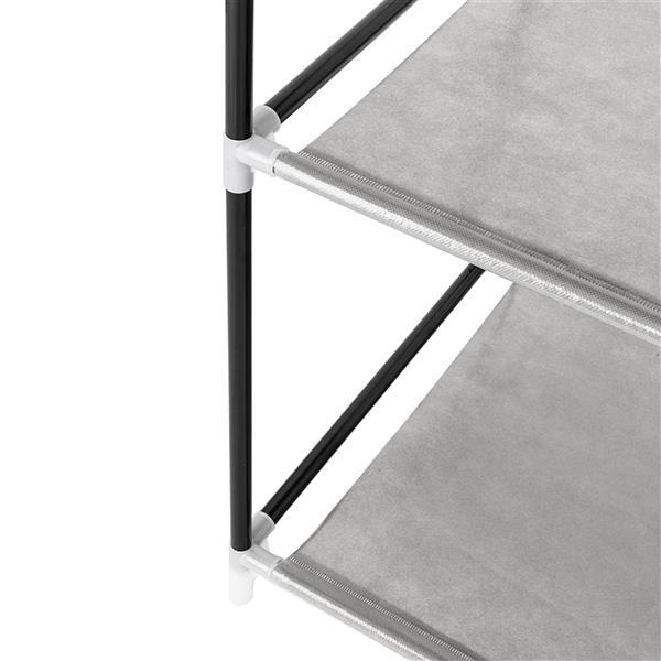 Close-up of Shopi Vella high legged fabric wardrobe with gray fabric shelves and black metal frame