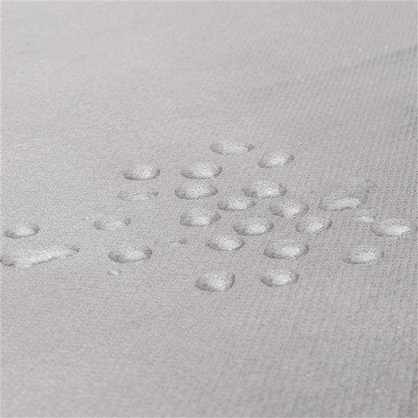 Close-up of water droplets on the fabric surface of a high legged fabric wardrobe from Shopi Vella