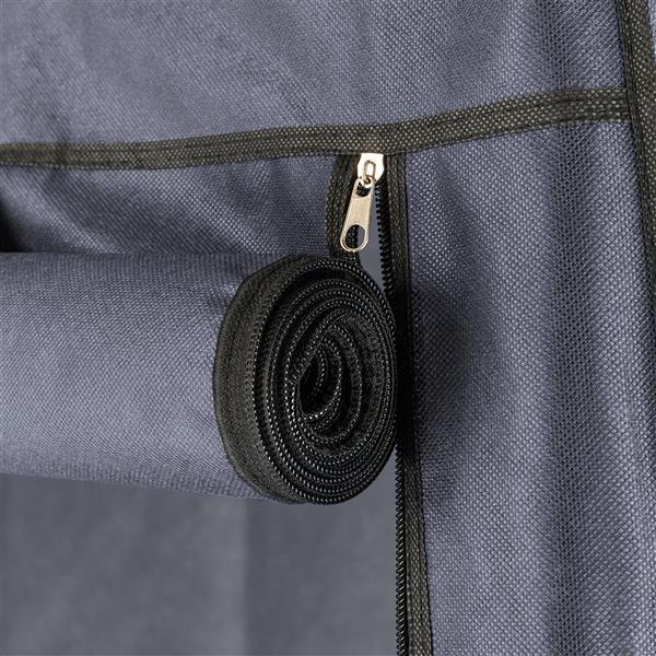 Close-up of zipper and rolled fabric flap on high legged fabric wardrobe by Shopi Vella