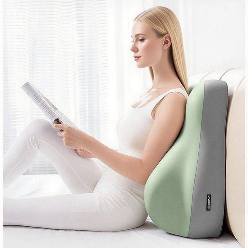 Shopi Vella pillow case on a hip raised sleep cushion supporting a woman reading in bed