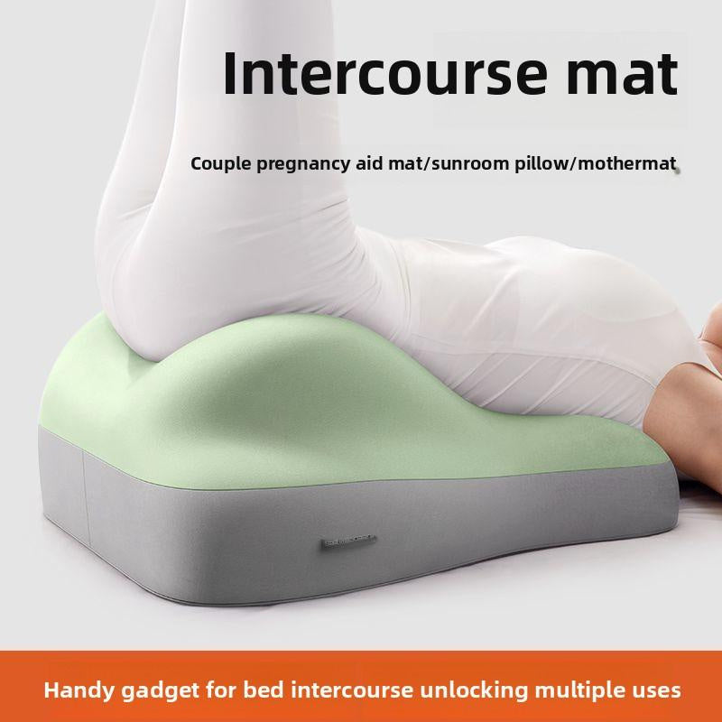 Shopi Vella hip raised sleep cushion in green and gray supporting legs and hips for comfort