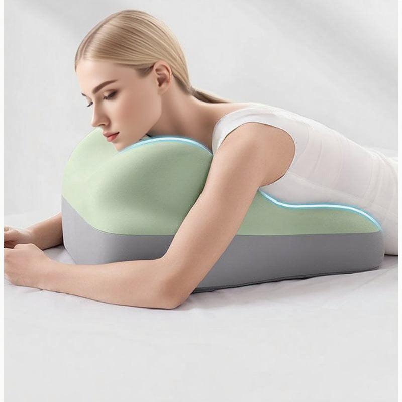 Woman resting on a hip raised sleep cushion with ergonomic design and soft pillow case