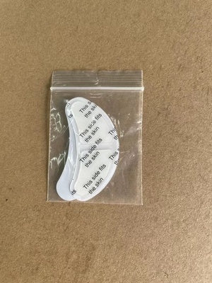 Shopi Vella home eye massager for dark circles replacement gel pads in clear plastic bag