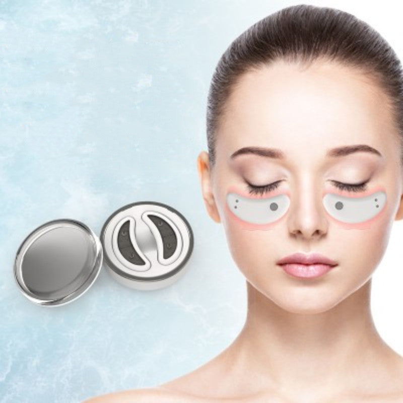 Shopi Vella home eye massager for dark circles with silicone pads shown on woman’s face and compact case
