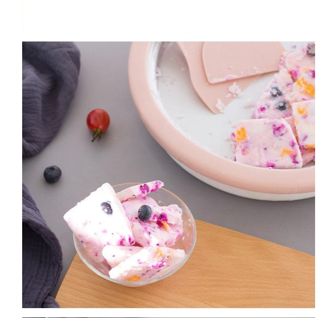Creamy homemade rolled ice cream with berries made using a homemade rolled ice cream machine