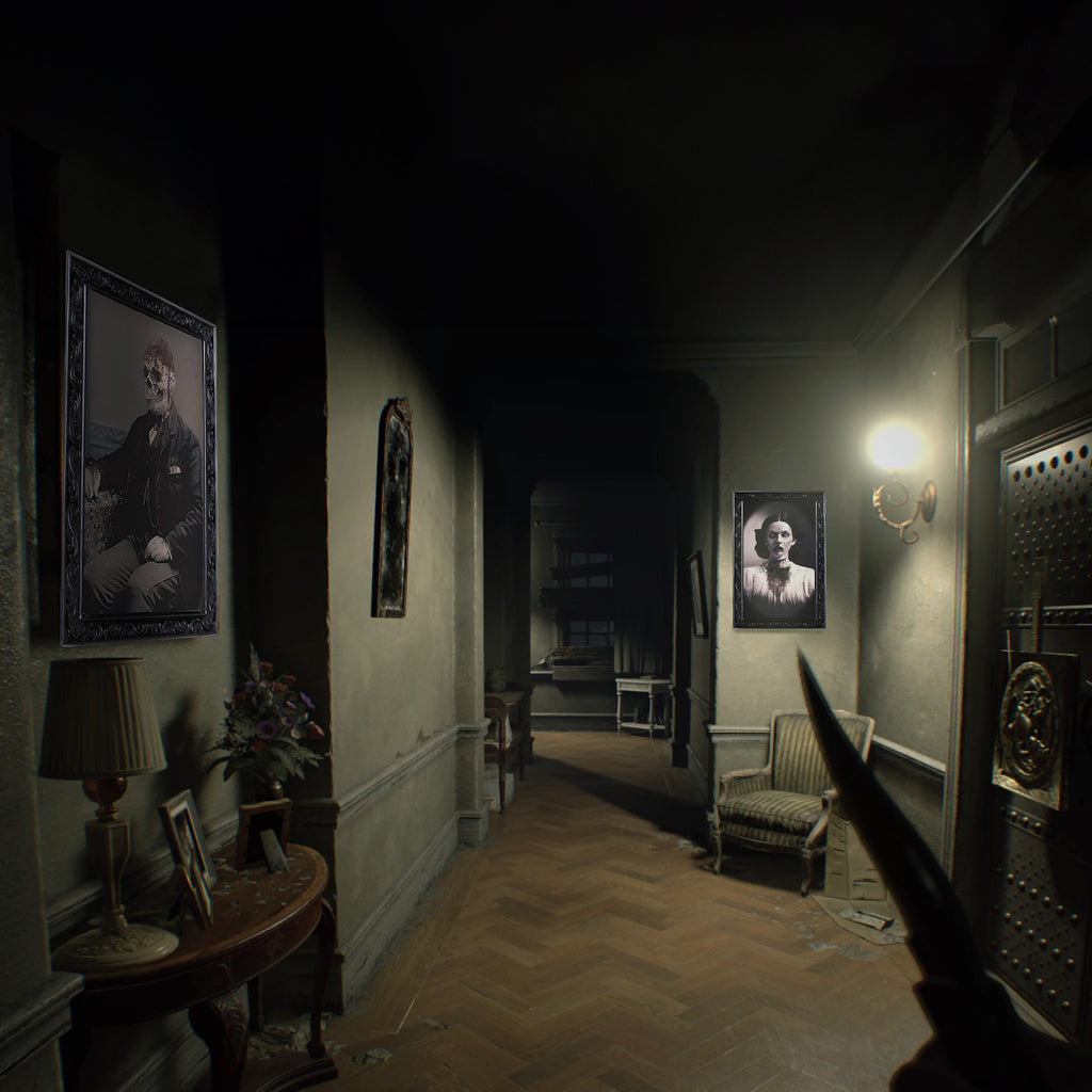 Dark creepy hallway with horror party decorations for home including eerie portraits and dim lighting