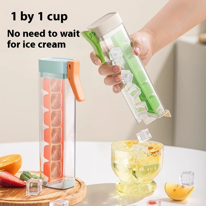 Shopi Vella household ice cube tray with storage in green and orange being used to dispense ice cubes into a glass