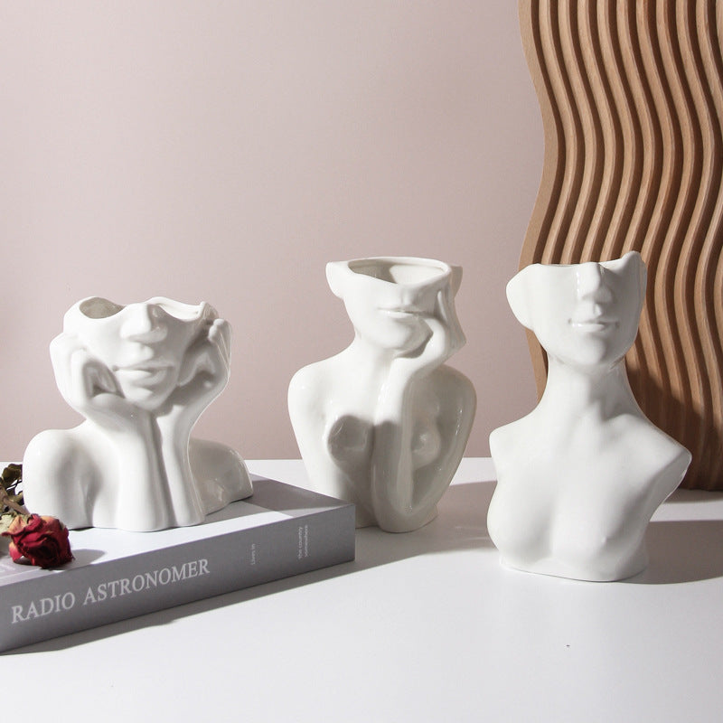 Shopi Vella human body ceramic vase set showing modern white ceramic vases shaped like abstract human bodies