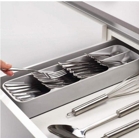 Shopi Vella kitchen utensil drawer organizer neatly holding silver forks and spoons inside a white kitchen drawer