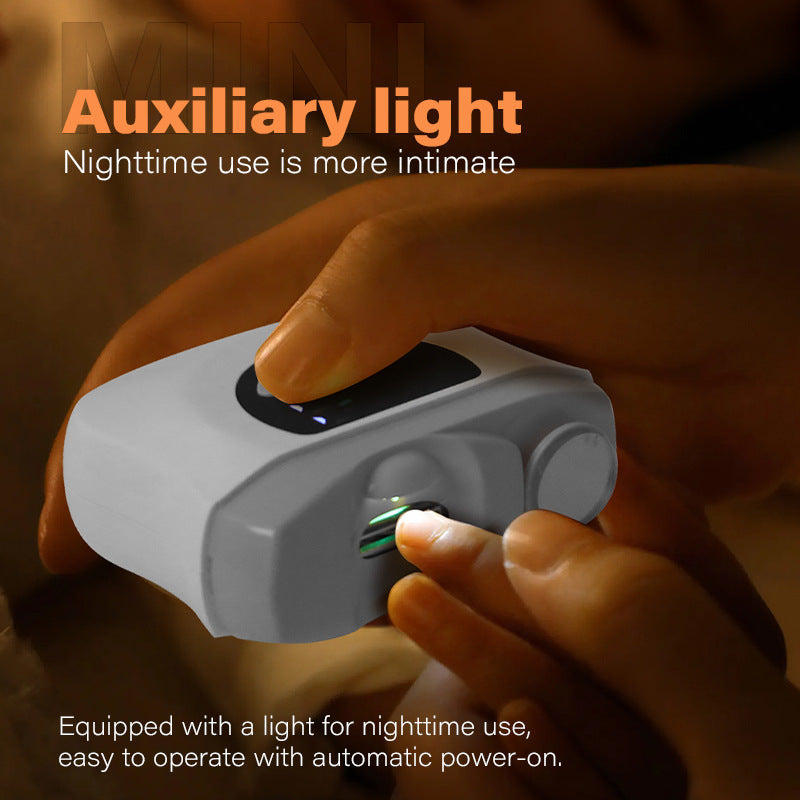 Electric nail clippers with LED light by Shopi Vella showing nighttime use with auxiliary light for easy operation