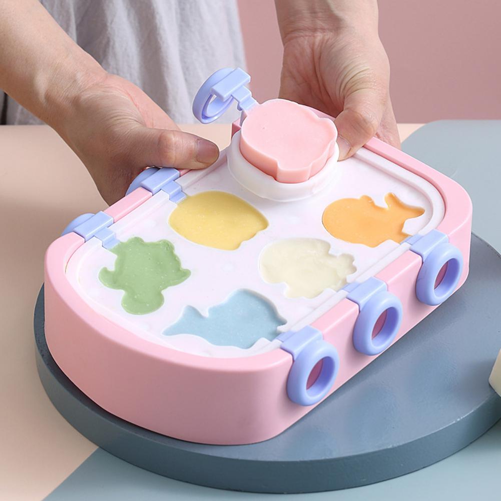 Shopi Vella kitchen storage ice hockey maker for kids with colorful molds and pink base