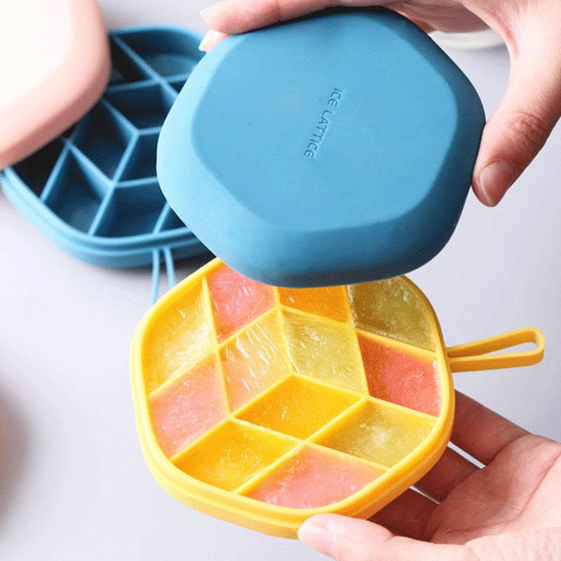 Shopi Vella 3D ice cream maker silicone mold with colorful frozen ice cubes in yellow and blue lids