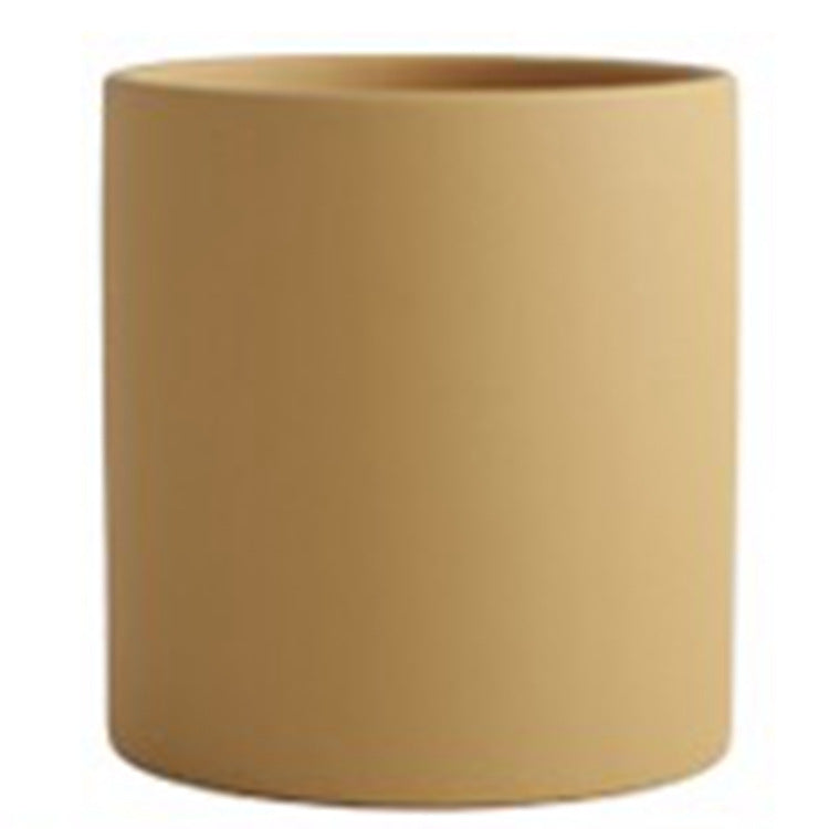 Shopi Vella industrial style planter pot in a smooth beige cylindrical design for home storage