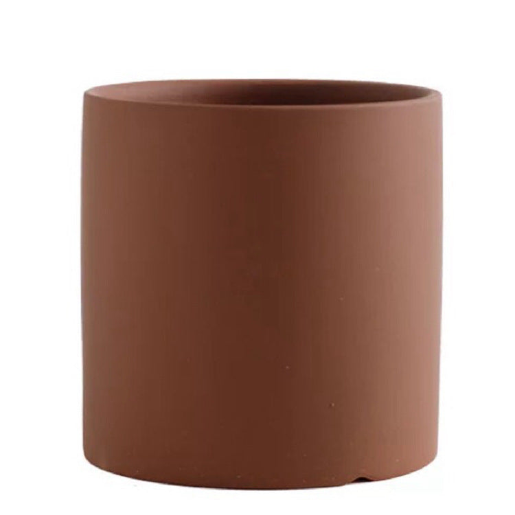 Shopi Vella brown industrial style planter pot with smooth cylindrical design for home storage