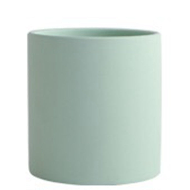 Shopi Vella industrial style planter pot in matte light green for home storage and décor