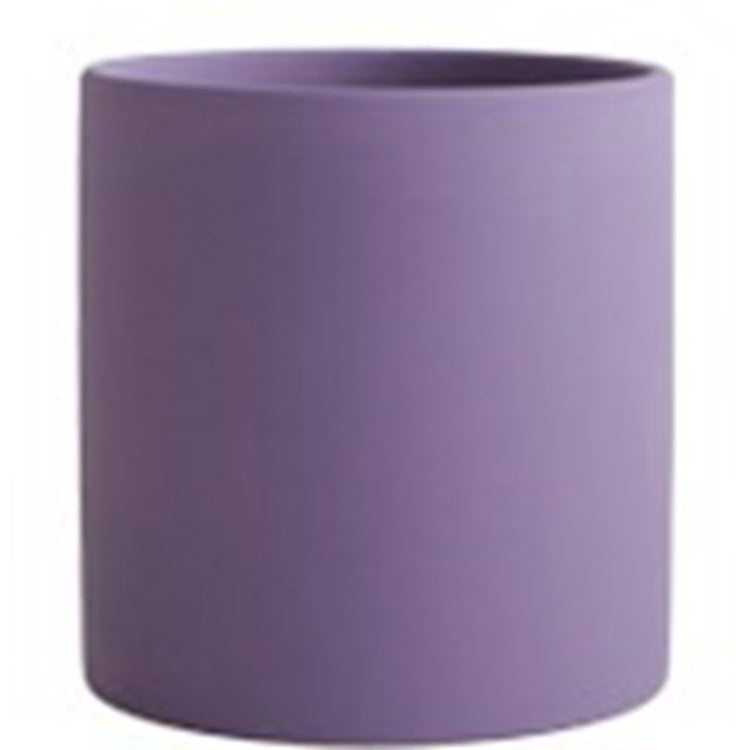 Purple industrial style planter pot for home storage by Shopi Vella with smooth cylindrical design