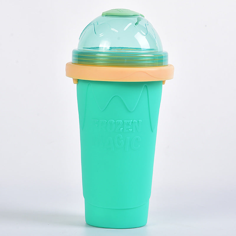 Shopi Vella instant frozen drink cup in teal with dome lid and beige rim for cold beverages