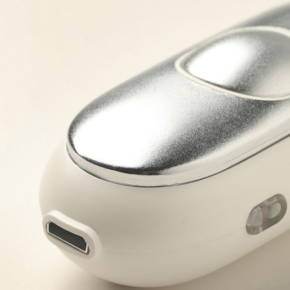 Close-up of Shopi Vella intelligent sleep therapy device in white and silver for home storage