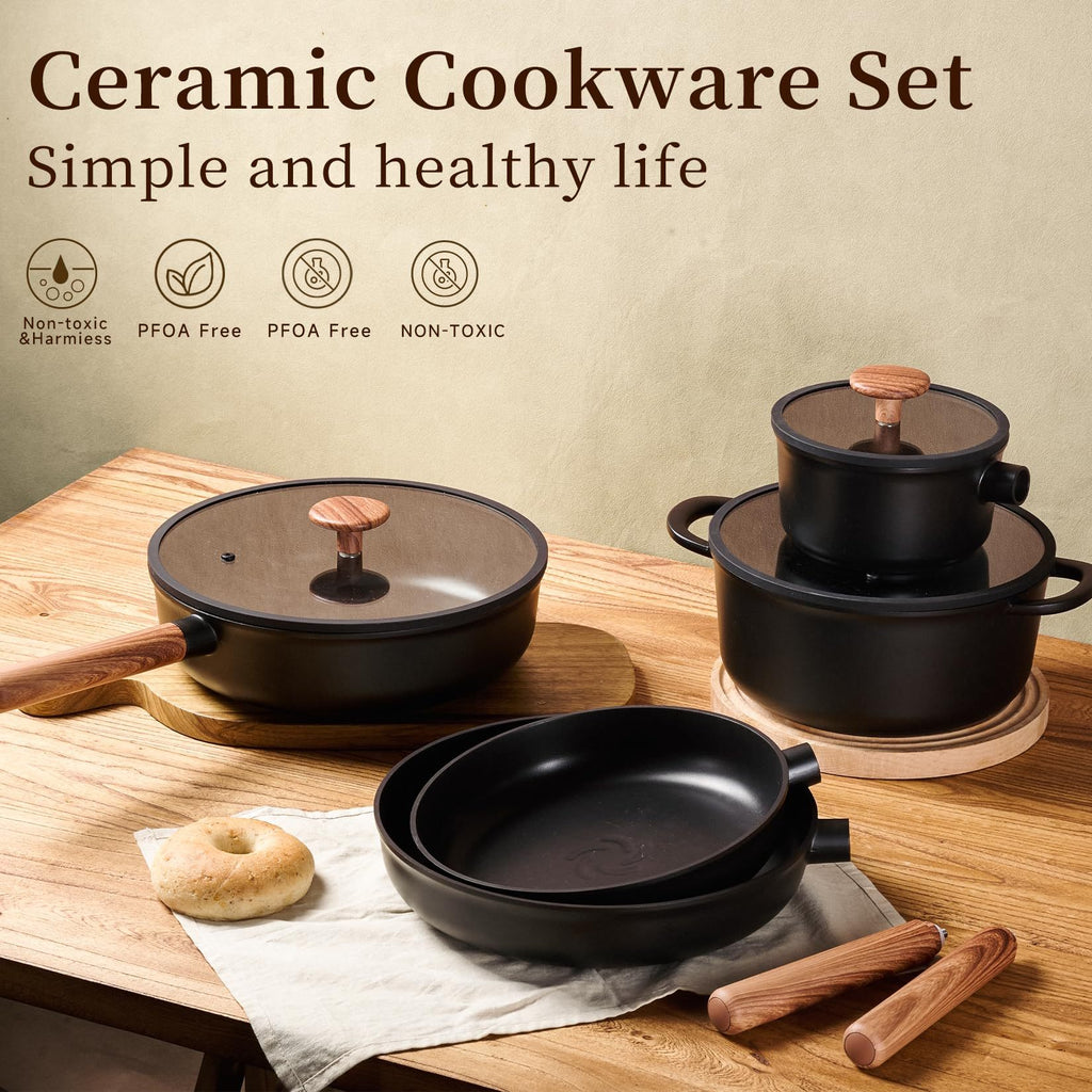 Shopi Vella ceramic cookware set with non stick pots and pans with removable handles on wooden table