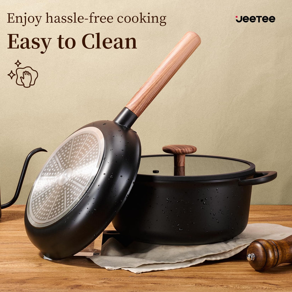 Shopi Vella non stick pots and pans with removable handles black cookware set on wooden surface