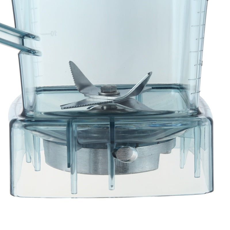 Close-up of JTC blender blade jar container showing sharp stainless steel blades and clear plastic base