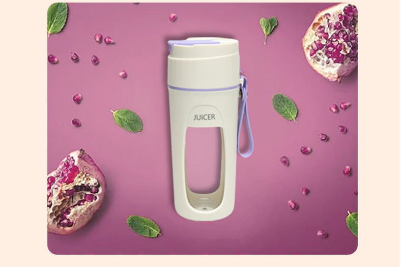 Shopi Vella best portable blender for smoothies in white with handle strap and juice container