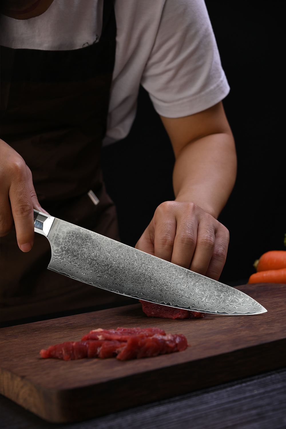 8 inch Damascus sushi knife cutting fresh raw fish on wooden board by a chef
