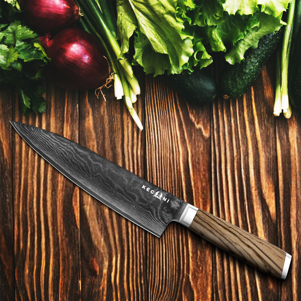 Ergonomic full tang chef knife with wooden handle on wooden surface next to fresh vegetables