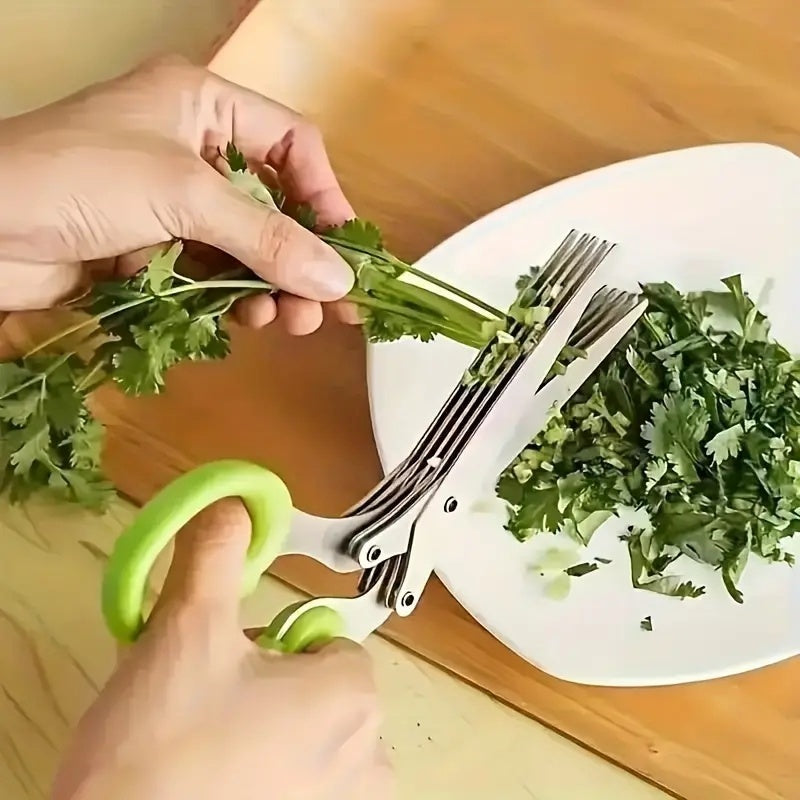 5-layer herb scissors cutting fresh cilantro over a white plate for easy herb preparation