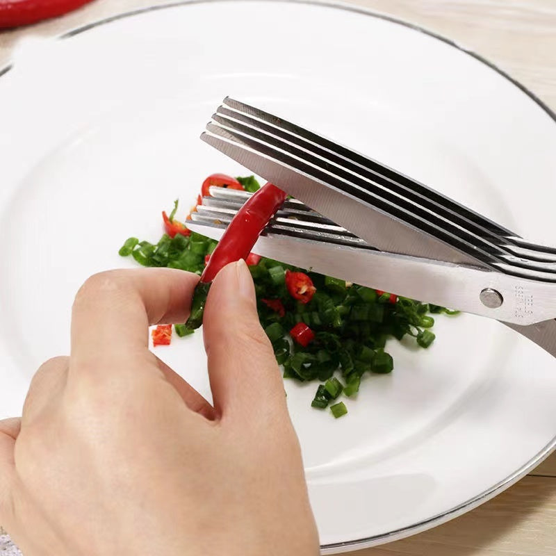 Shopi Vella 5-layer herb scissors chopping red chili and green herbs on white plate
