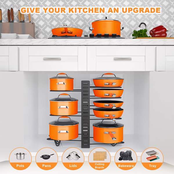 Shopi Vella kitchen cabinet organizers holding orange pots pans lids and bakeware under white kitchen counter