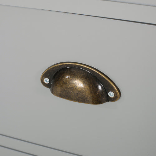 Close-up of antique brass drawer handle on gray kitchen island on wheels by Shopi Vella