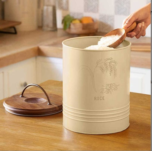 Shopi Vella kitchen rice canister with wooden lid and beige metal container on wooden table