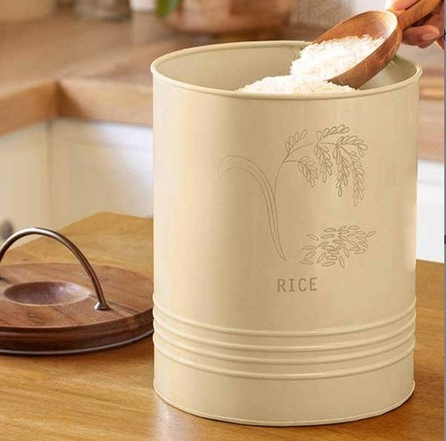 Shopi Vella kitchen rice canister with wooden lid holding white rice on a wooden countertop