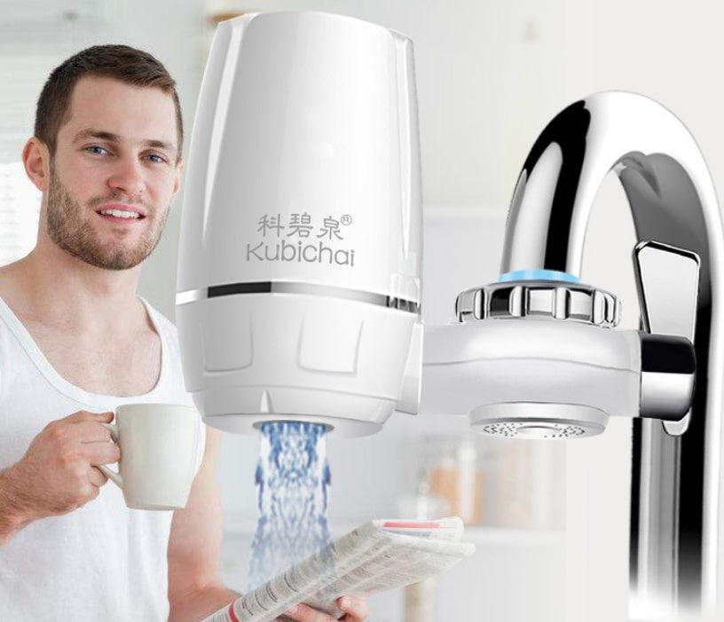White kitchen faucet water filter attached to chrome faucet with man holding a cup and reading a newspaper