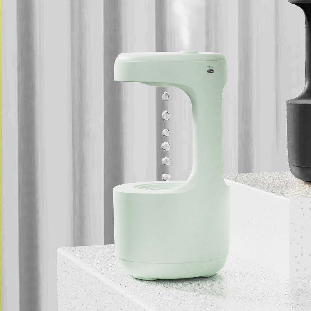 Shopi Vella large capacity aroma diffuser in mint green with modern design on white countertop